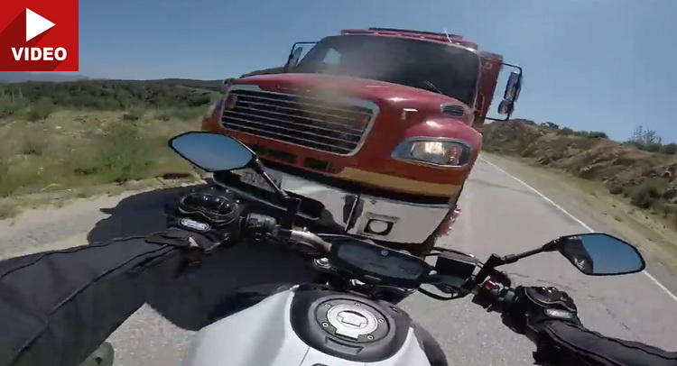  Biker Hits Truck Head-On, Lives To Post About It