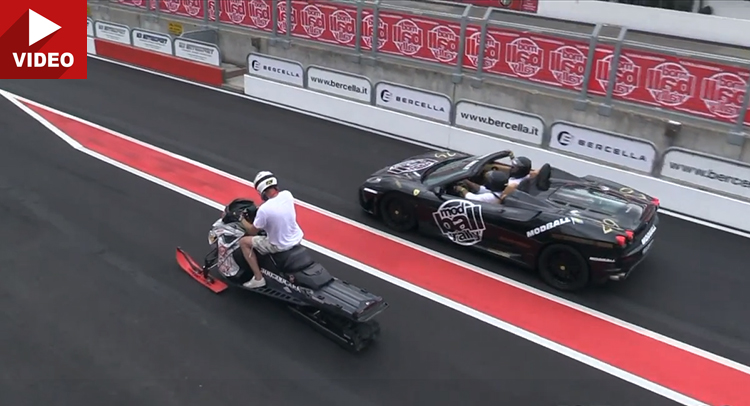  Snowmobile Challenges A Couple Of Ferraris To A Drag Race