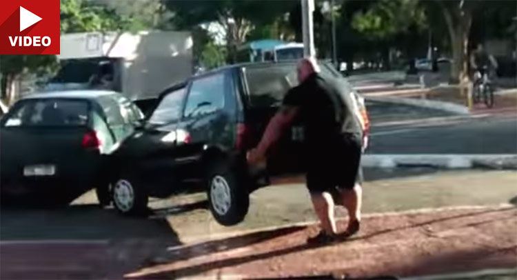  Watch This Cyclist Toss A Car Standing In His Way