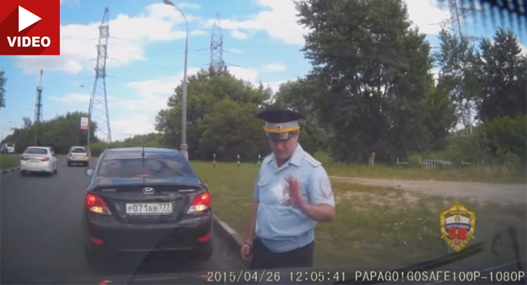  Russian “Cop” Seems To Be Playing On The Wrong Side…