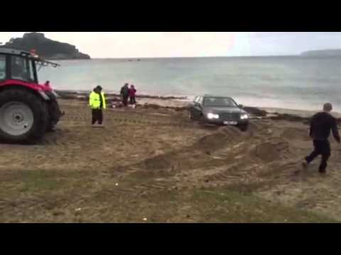  Russian Lad Gets Bentley Flying Spur Stuck On A Beach
