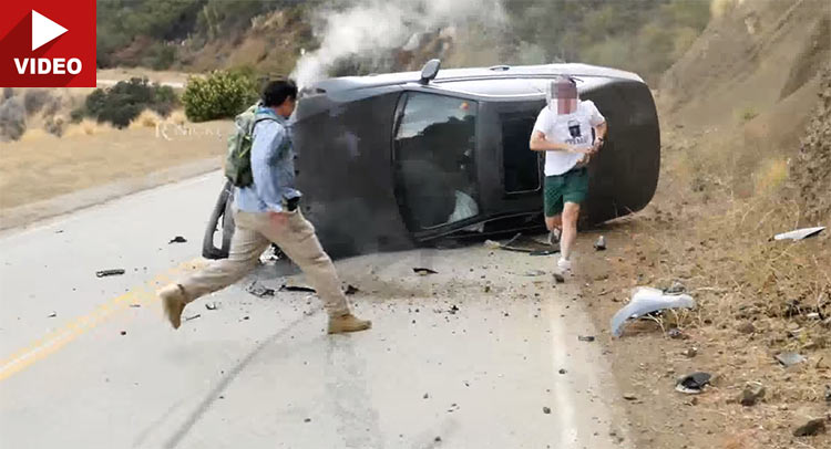  Watch BMW Driver Crash Into Hillside And Flip Over; Take Note Of His T-Shirt
