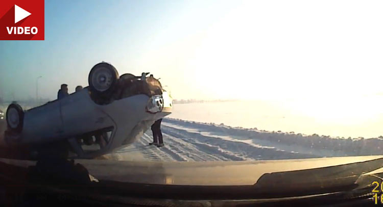 Car Flips Over After Hitting Snowbank In Russia