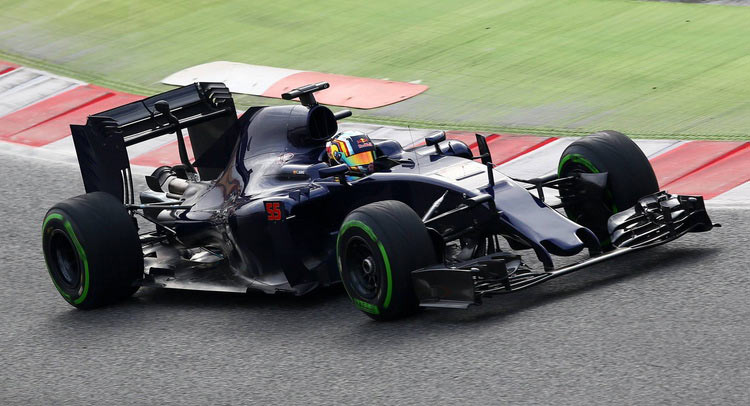  Toro Rosso STR11 Shows Up In Barcelona Sans Livery