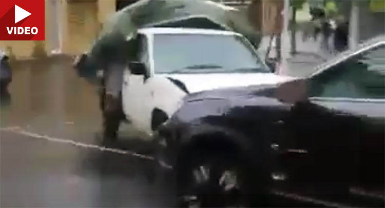 Nissan Driver Batters A Pair of Holdens