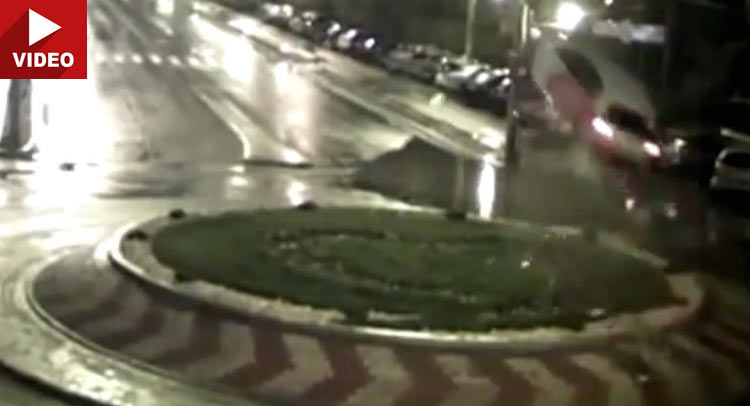 Driver Does A Dukes Of Hazzard Jump Over Roundabout, Sticks The Landing