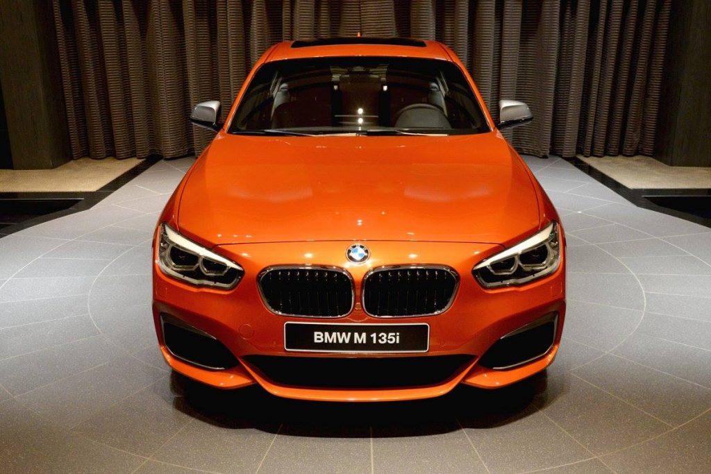 Valencia Orange BMW M135i On Display At Abu Dhabi Showroom | Carscoops