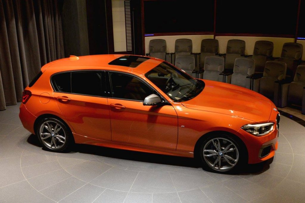 Valencia Orange BMW M135i On Display At Abu Dhabi Showroom | Carscoops