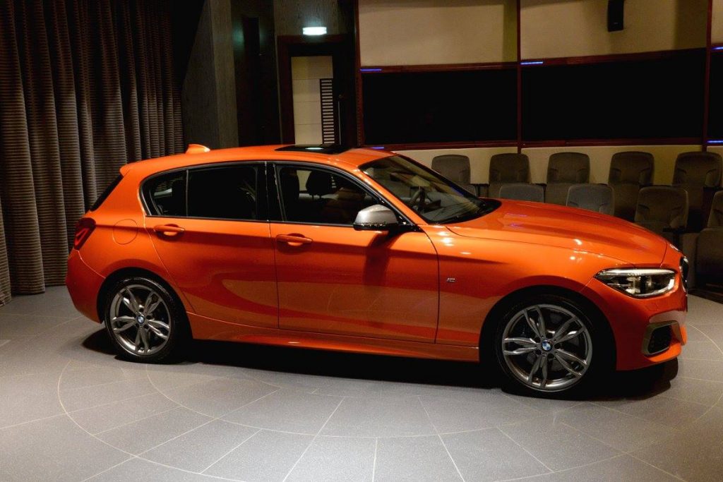 Valencia Orange BMW M135i On Display At Abu Dhabi Showroom | Carscoops