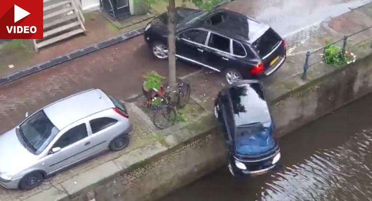 Porsche Cayenne Pushes Smart Into Canal