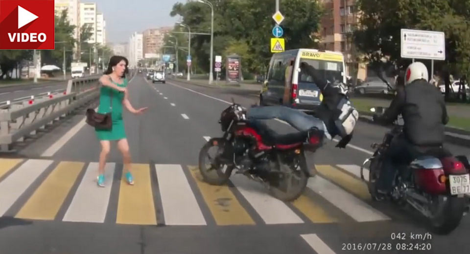 Woman Dodges Motorcycle After Bikes Collide