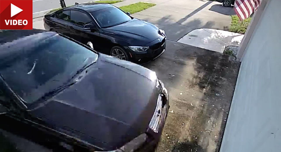 Driver Pulls Off Epic Drift Smashing Into A Closed Garage