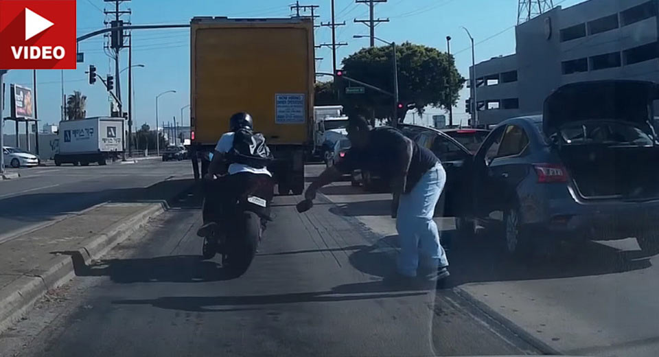  Driver Goes After Biker With A Hammer During Road Rage Episode