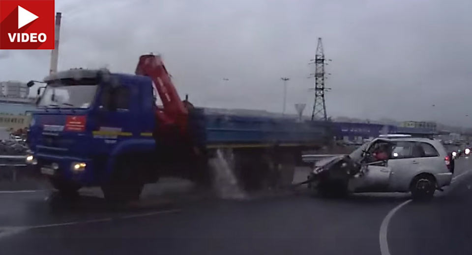 Toyota RAV4 Understeers Into A Truck In Rainy Russia