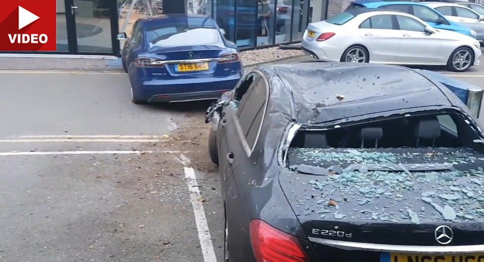 Tesla Model S Jump Lands On E-Class Before Crashing Into Mercedes Dealership