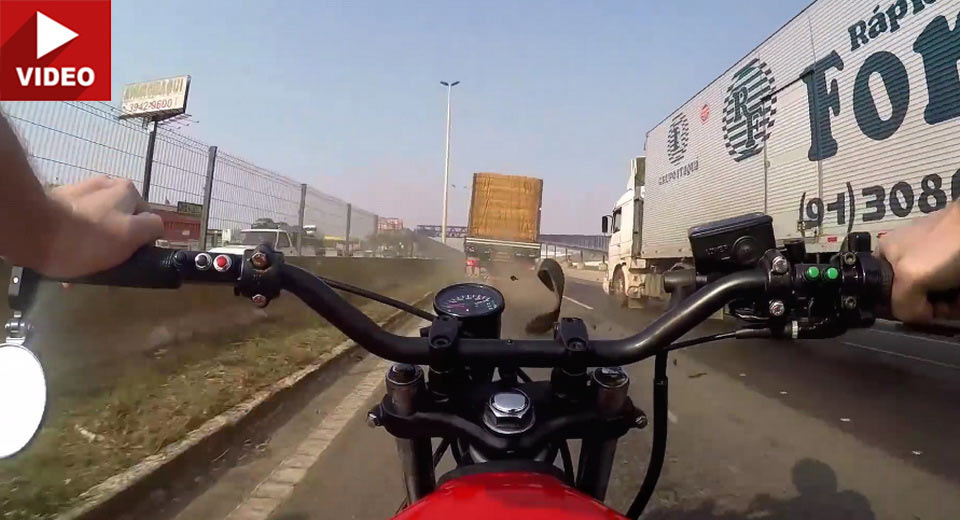 Rider Has Close Call With An Exploding Truck Tire