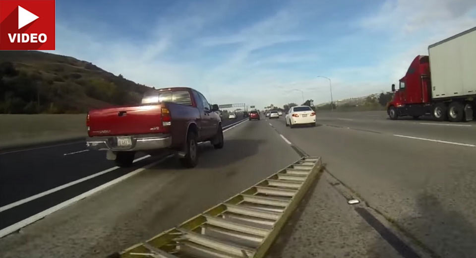 Rider Comes Face To Face With Ladder On Freeway, Crash Ensues