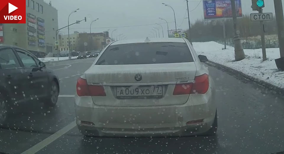  BMW 7-Series Driver Loses It, Crashes Into Pole Head-On