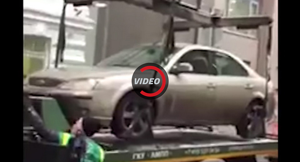  Oops! Tow Truck Crane Accidentally Squashes Car In Moscow