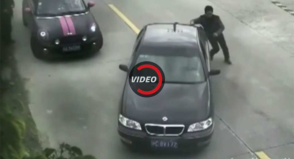 Driver Reverses Into Chinese River While Knocking Down Biker