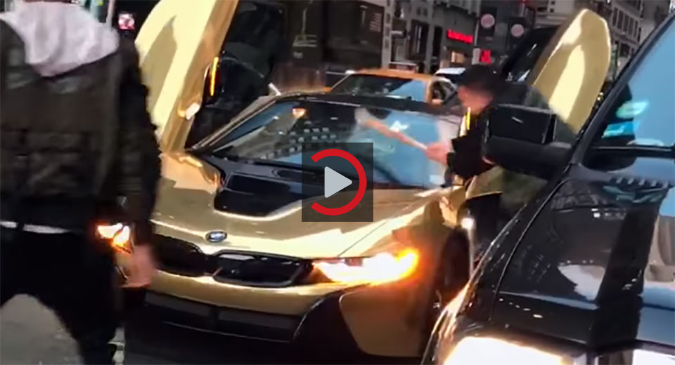 Gold BMW i8 Has Its Windshield Smashed In Weird (Staged?) Stunt