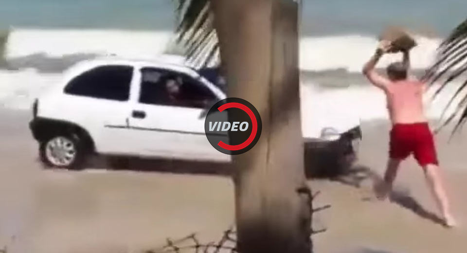 Brazilian Driving On The Beach Gets His Windshield Smashed By Angry Father