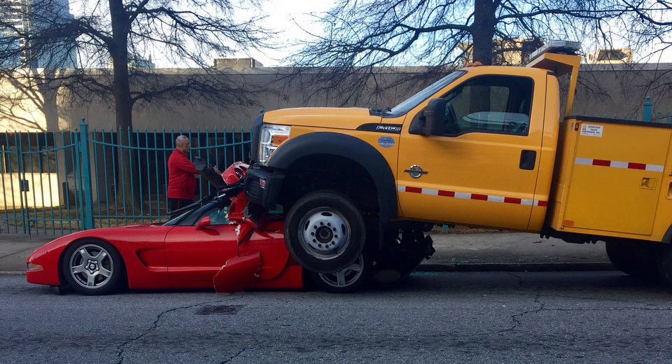  Ford City Truck Ends Up On Top Of Corvette, Driver Survives