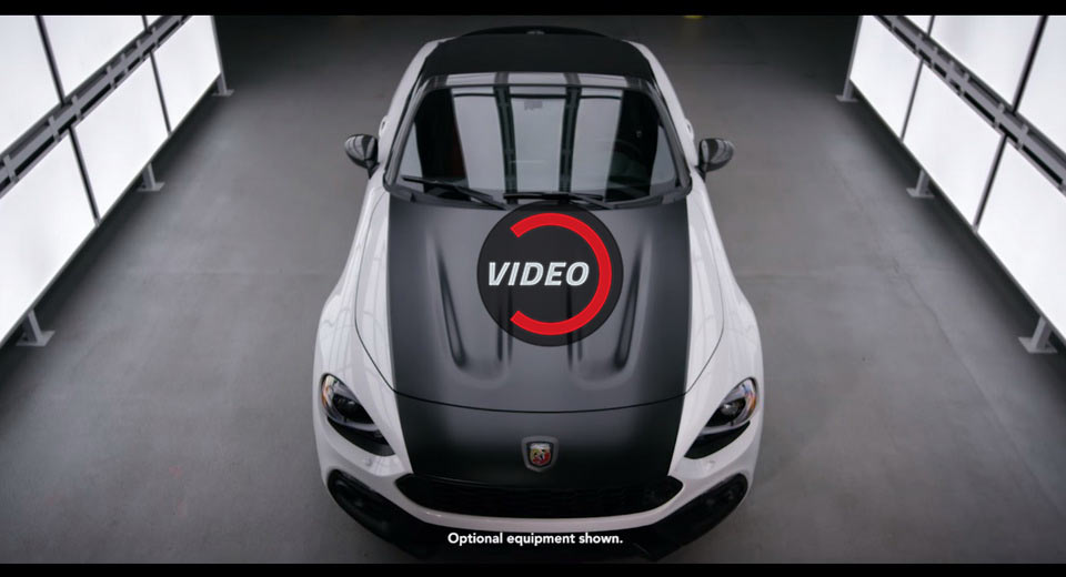  Fiat Shows How 124 Spider Abarth Gets Its Flat-Black Stripe Applied By Hand