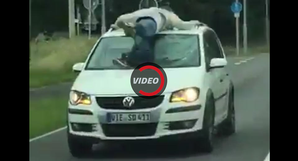 24-Year-Old Grasps Onto VW In Bizarre German Incident