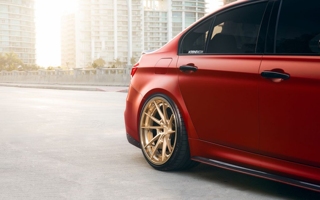 Red BMW M3 Tries To Look Special With Gold Wheels | Carscoops