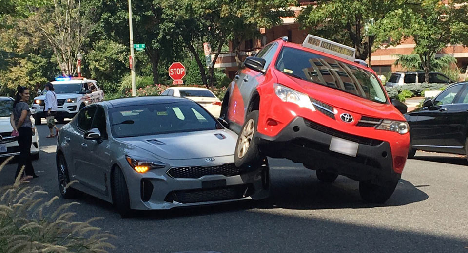 This Sad Kia Stinger Was Squished By A Toyota RAV4