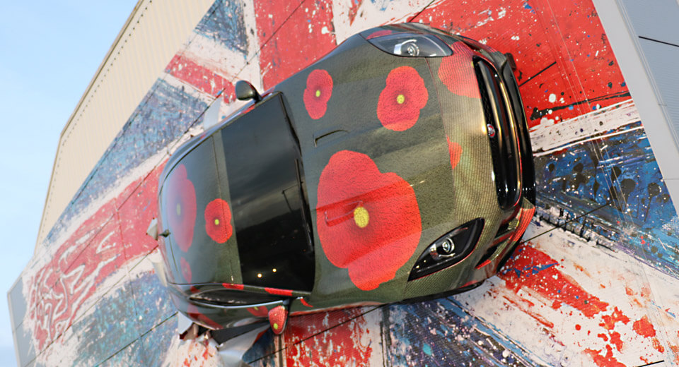 Jaguar F-Type Climbs Up The Factory Wall To Honor Veterans