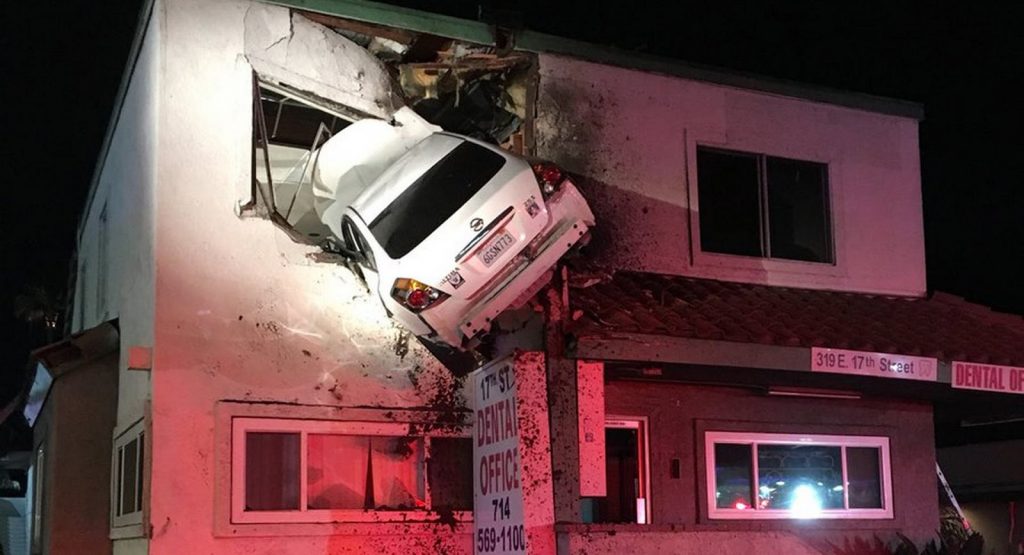 Dramatic Crash Sends Nissan Flying Into Second Floor Of Dentistry