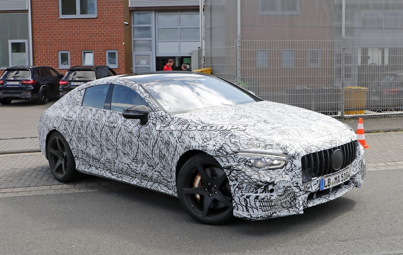 AMG-GT4-Less-Camo-Spy-11 Mercedes-AMG GT4 Will Reportedly Debut In Geneva