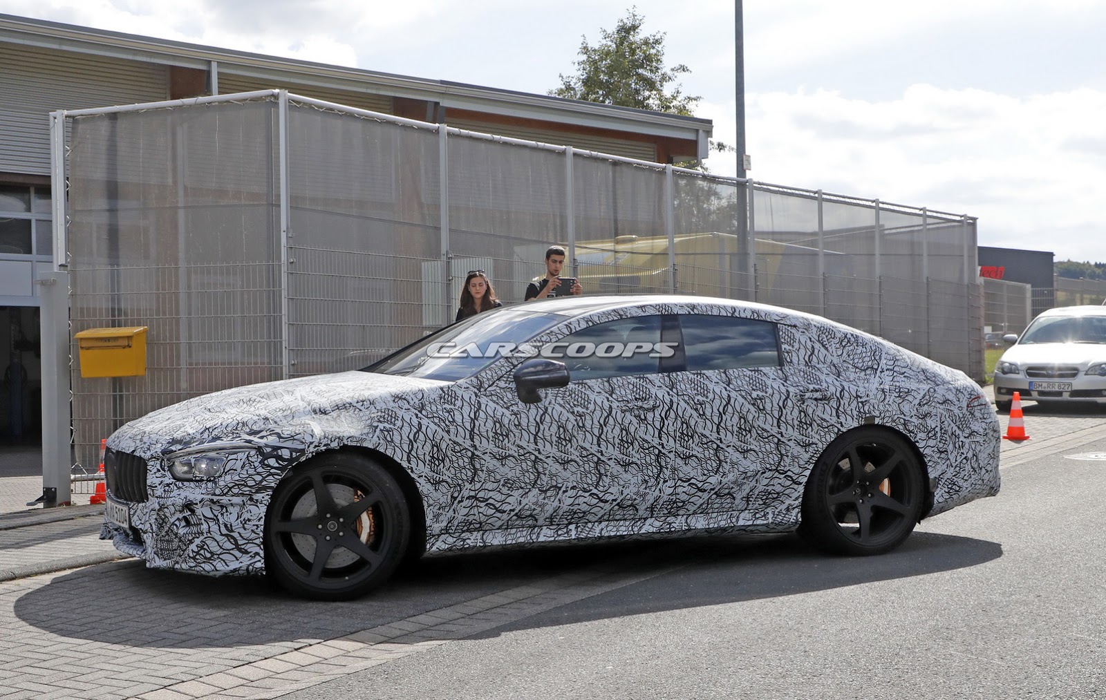 AMG-GT4-Less-Camo-Spy-24 Mercedes-AMG GT4 Will Reportedly Debut In Geneva