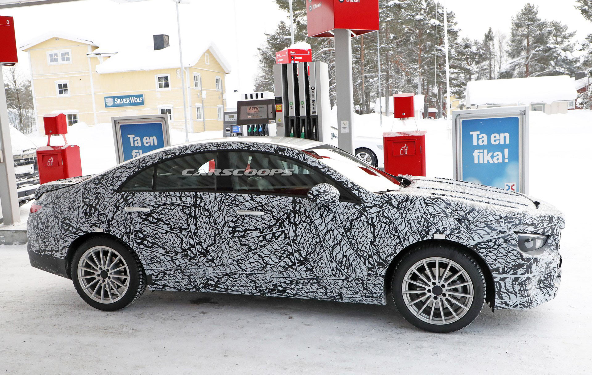 Mercedes-CLA-4 Honey, I Shrunk The CLS: Pint-Sized Mercedes CLA Scooped Getting Gas