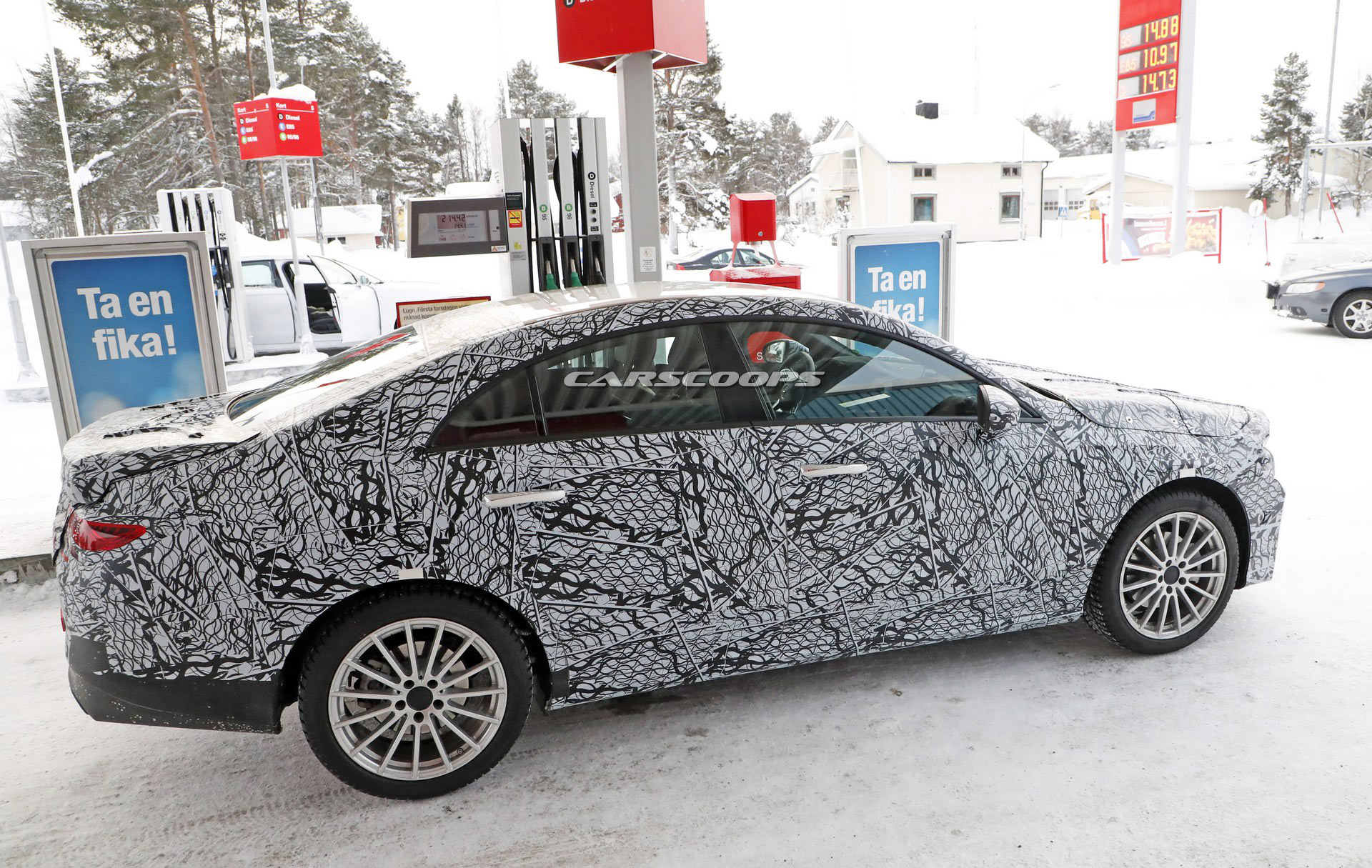 Mercedes-CLA-8 Honey, I Shrunk The CLS: Pint-Sized Mercedes CLA Scooped Getting Gas