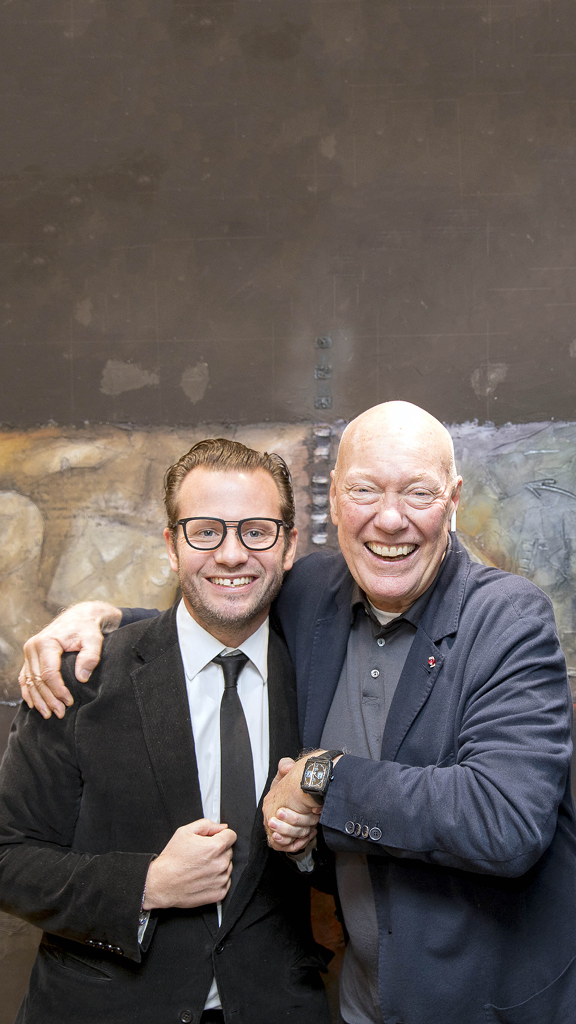 TAGHeuer_George Bamford and Jean-Claude Biver wearing the Monaco Bamford copy Forged Carbon Fiber Brings The Heuer Monaco Into Supercar/F1 Territory