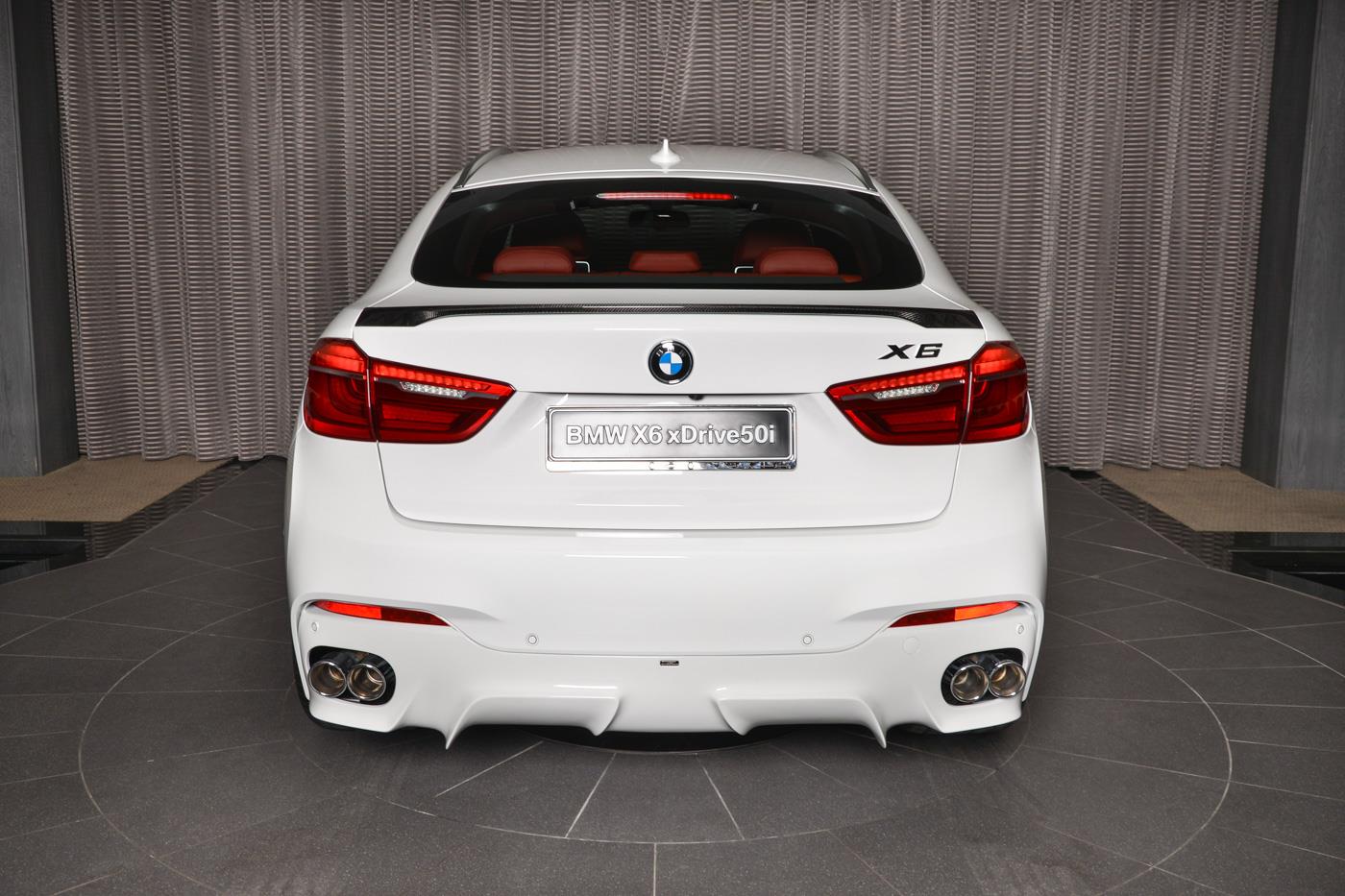 bmw-x6-xdrive50i-abu-dhabi-14 White BMW X6 Flaunts M Performance Kit And Custom Exhaust