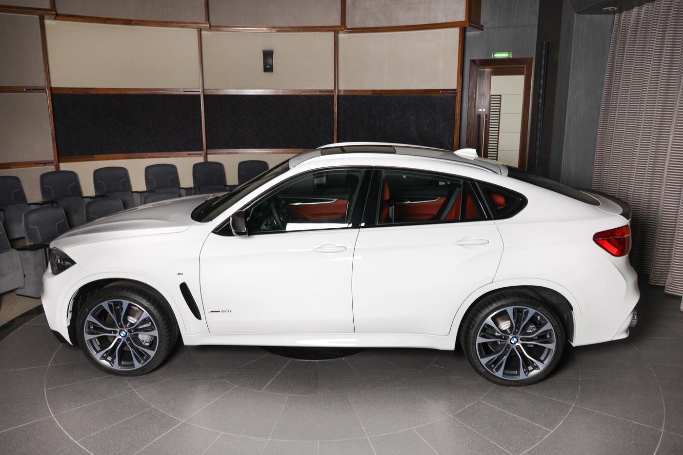bmw-x6-xdrive50i-abu-dhabi-5 White BMW X6 Flaunts M Performance Kit And Custom Exhaust