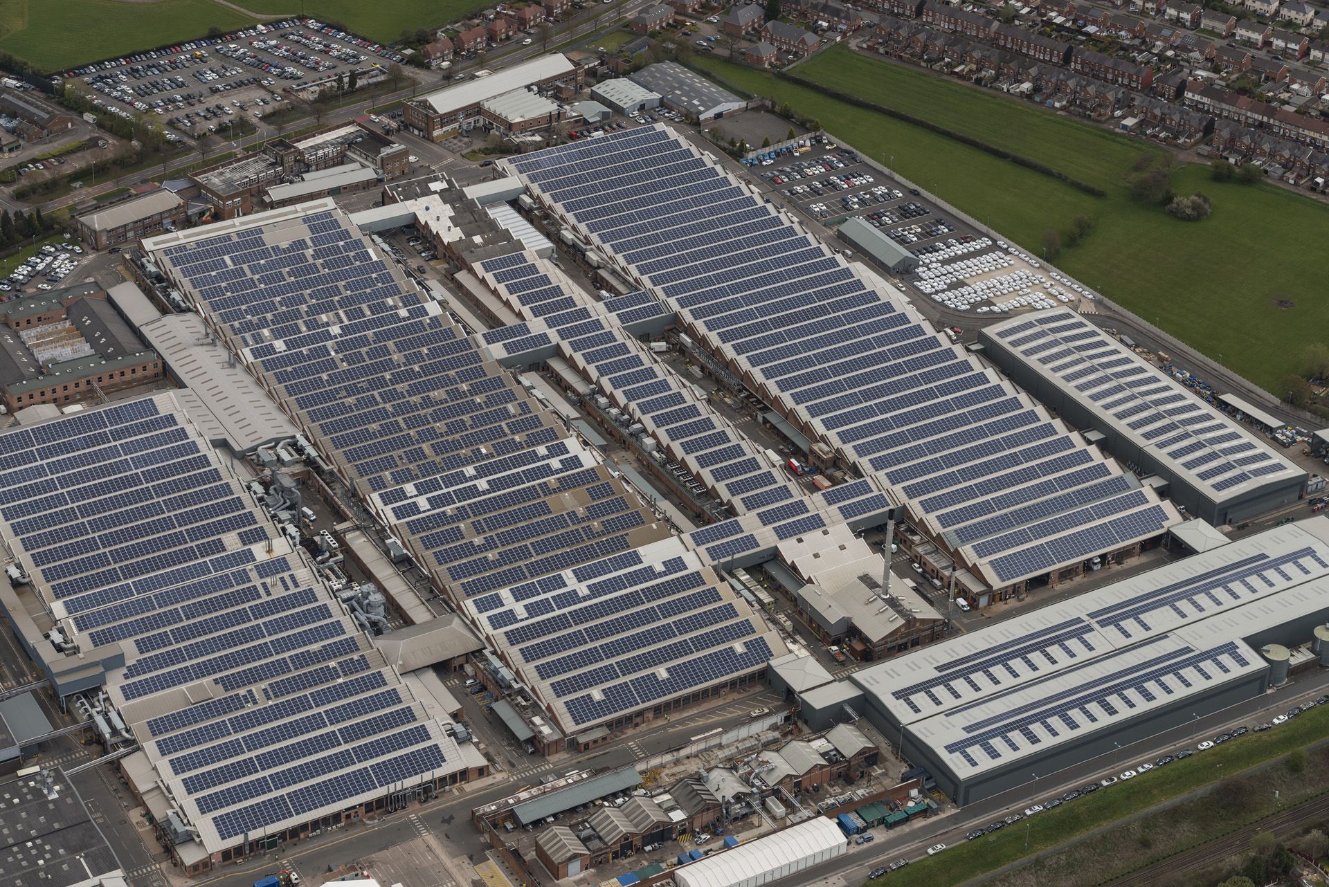 Bentley factory with roof top solar panels Bentley Harnesses The Power Of The Sun With The UK’s Largest Solar Parking Lot
