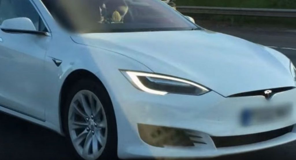  Tesla Driver Nabbed Riding In Passenger Seat With Autopilot On