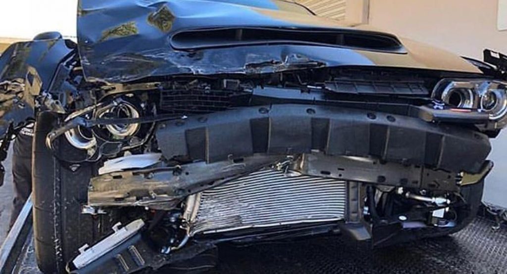 Dodge Demon Hits Three Parked Cars, Gets Beaten Up Quite Badly