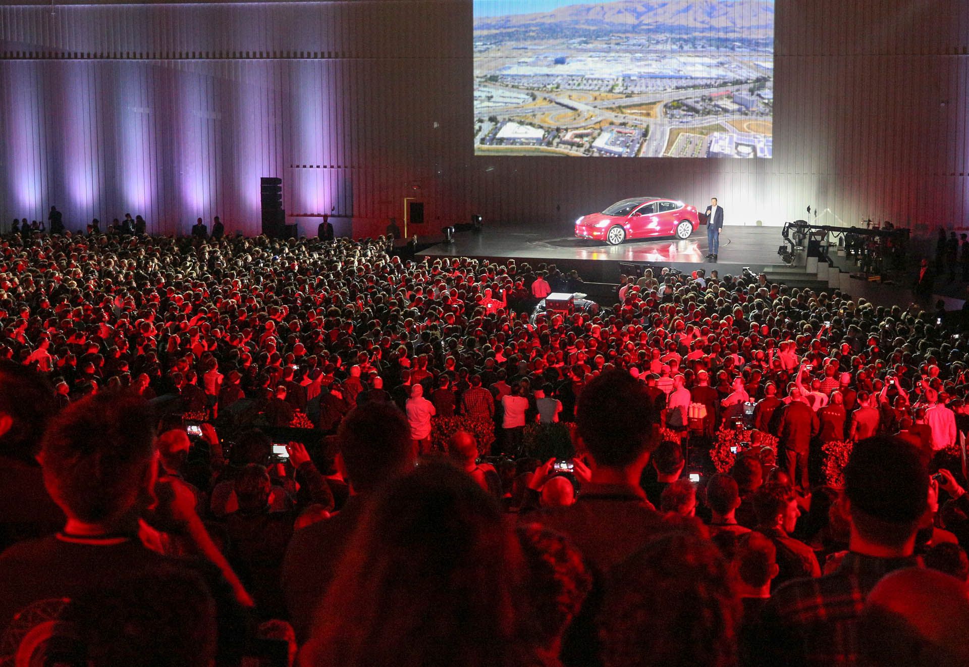 tesla-model 3 delivery event crowd Tesla’s Autopilot Chief Leaves For Intel