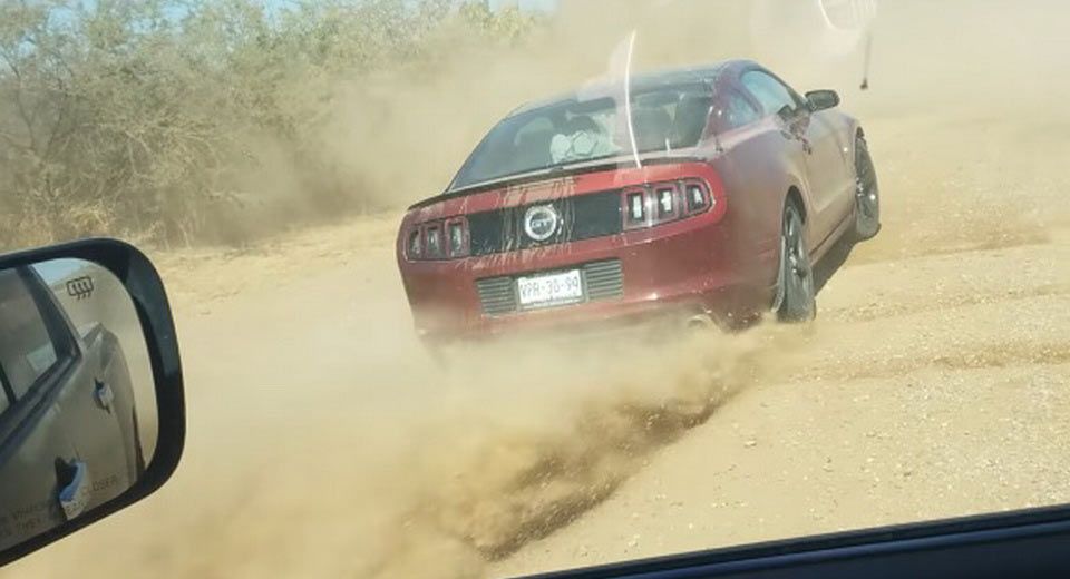 Ford Mustang Driver Sprays Rocks, Smashes Pickup Truck’s Windows