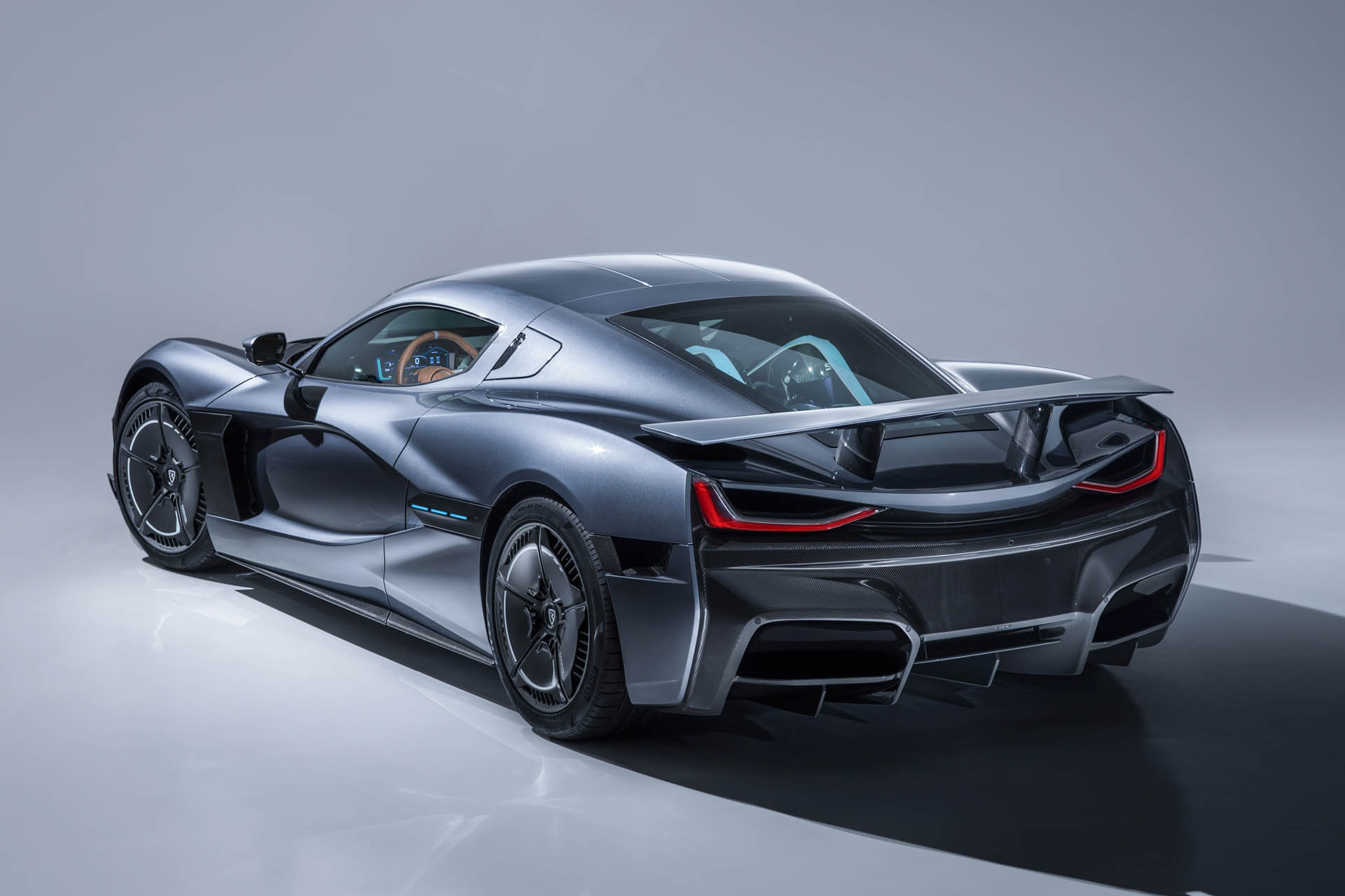 rimac_c_two_studio_rear34_01 Porsche Buys 10 Percent Of Rimac To Help With Future Electric Vehicles