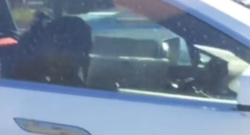  Is This Tesla Mobile Service Technician Sleeping Behind The Wheel?