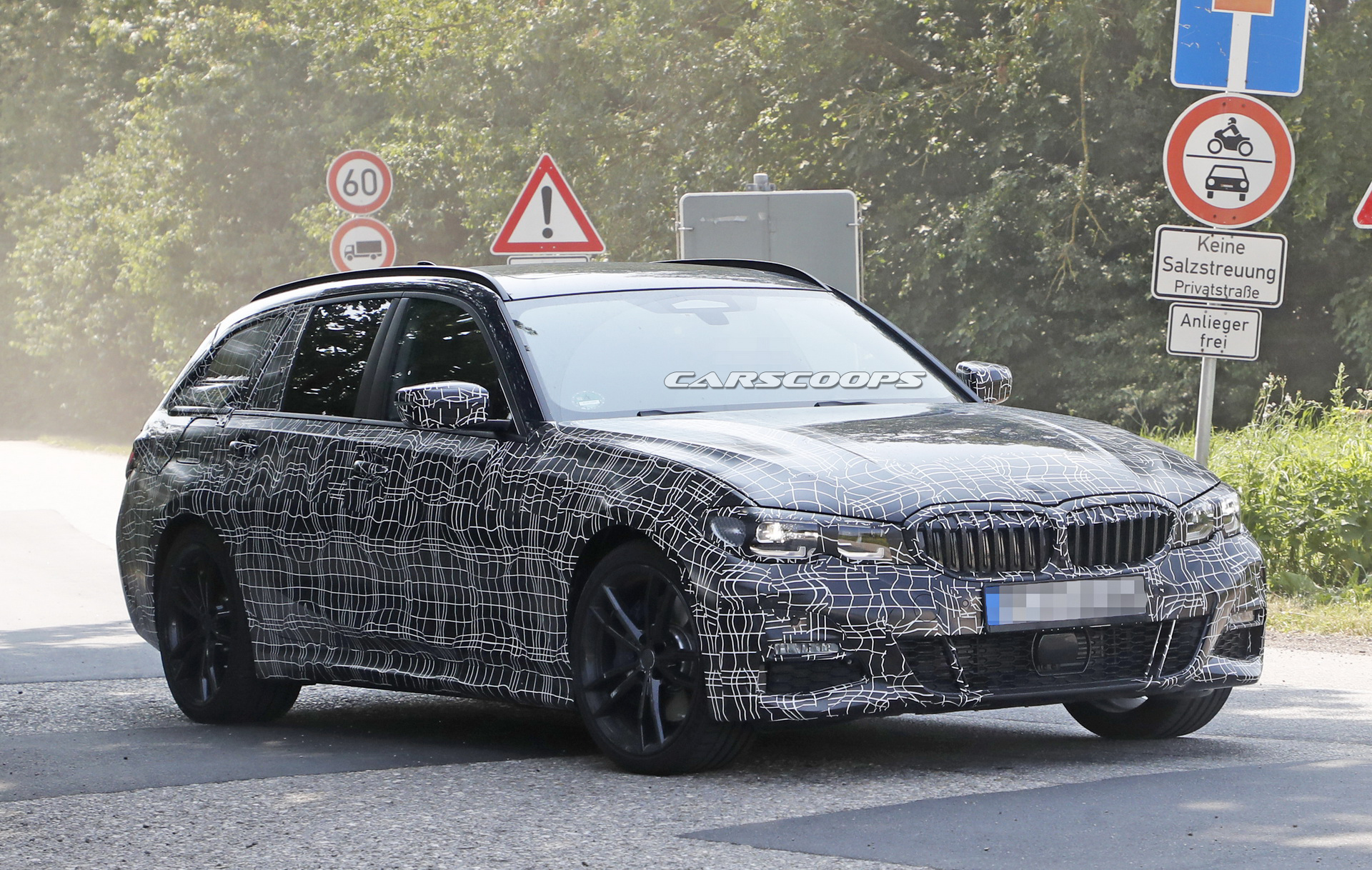 bmw-3series-touring-spy-shots-tight-camo-2 2019 BMW 3-Series Touring Spied Looking Like A Little 5er (New Photos)