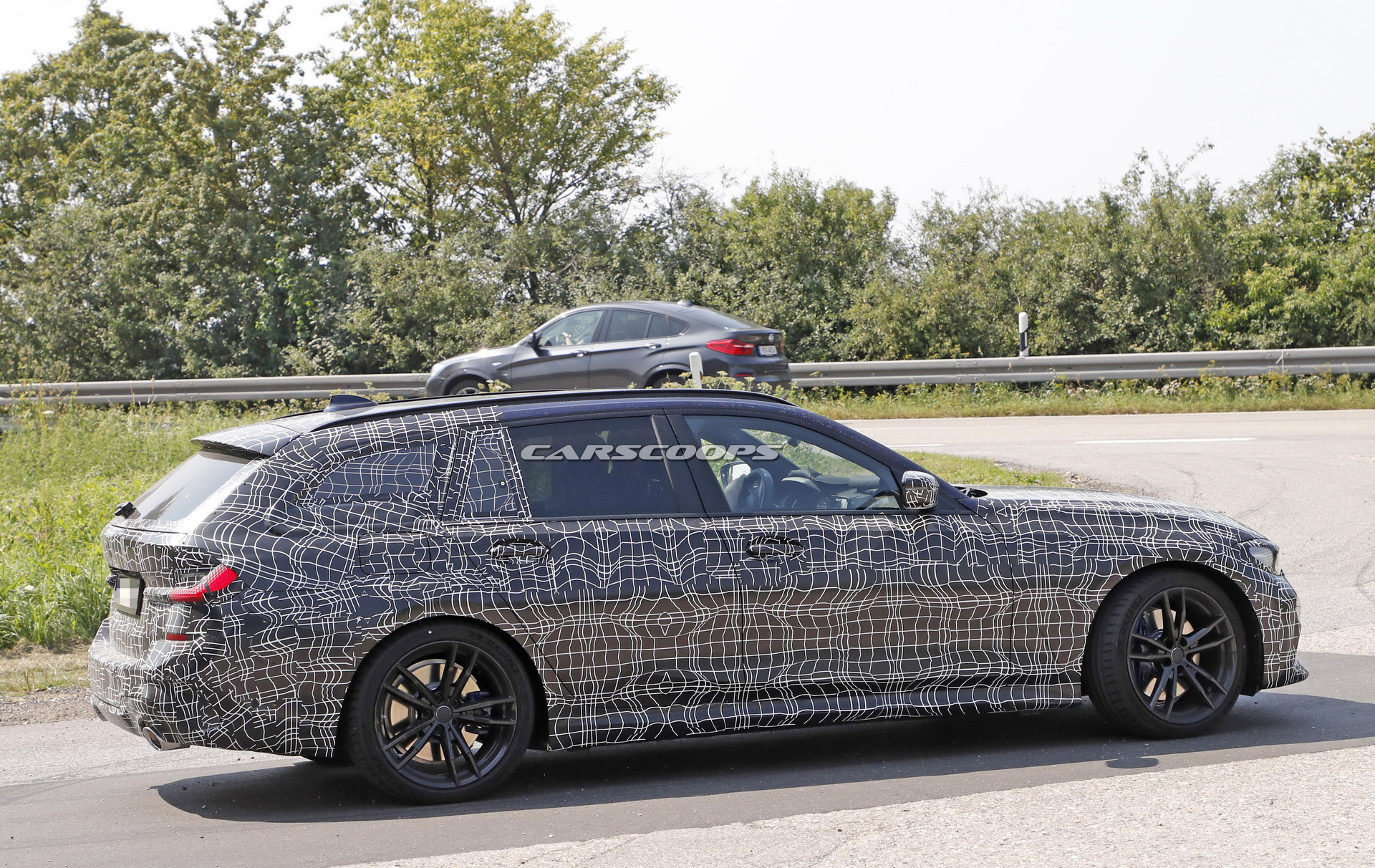 bmw-3series-touring-spy-shots-tight-camo-7 2019 BMW 3-Series Touring Spied Looking Like A Little 5er (New Photos)