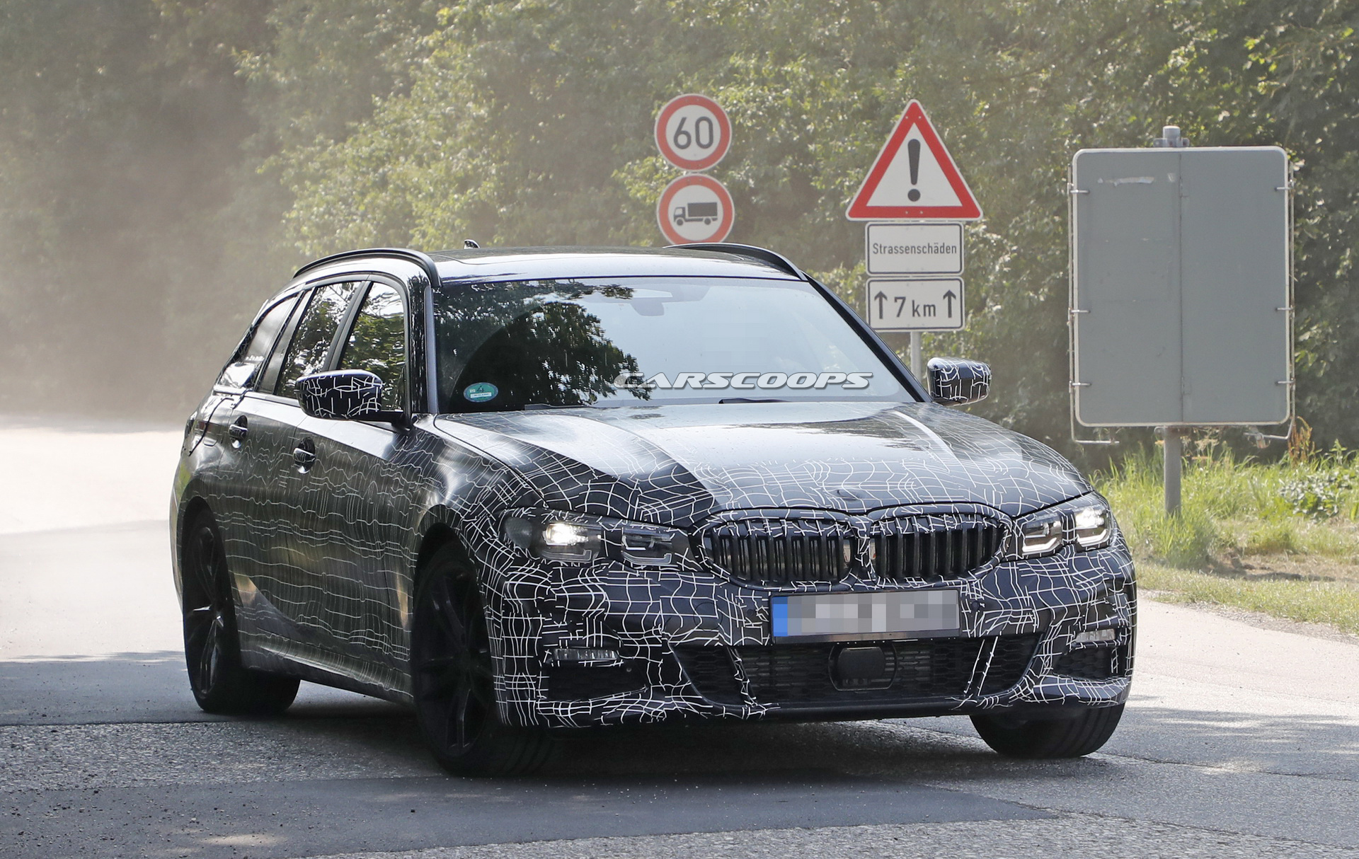 bmw-3series-touring-spy-shots-tight-camo-1 2019 BMW 3-Series Touring Spied Looking Like A Little 5er (New Photos)